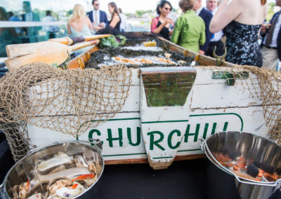 Row boat raw bar at a Churchill Events wedding at Ocean Gateway in Portland Maine. Photo by Peter Greeno Photography